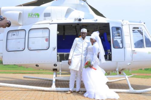 Couple board Helicopter